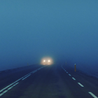 Blurred headlights on the road at night in Iceland 